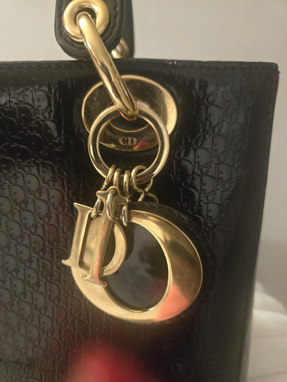 Black Structured Patent Leather Top-Handle Bag with Gold Hardware
